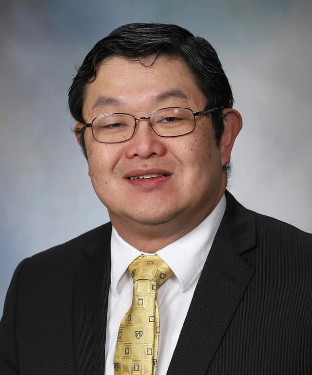 Portrait — extracted from the 2025 Sunshine Symposium brochure